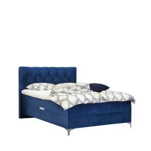plavi Boxspring krevet Deluxe namješten slikan s prednje lieve strane
