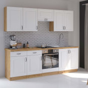 modularna kuhinja Stilo s pećnicom uz sivi zid