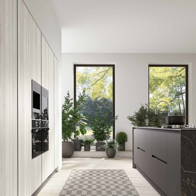 moderna kuhinja Azimut s 2 pećnice i elementima u crnoj boji slikana s lijeve strane
